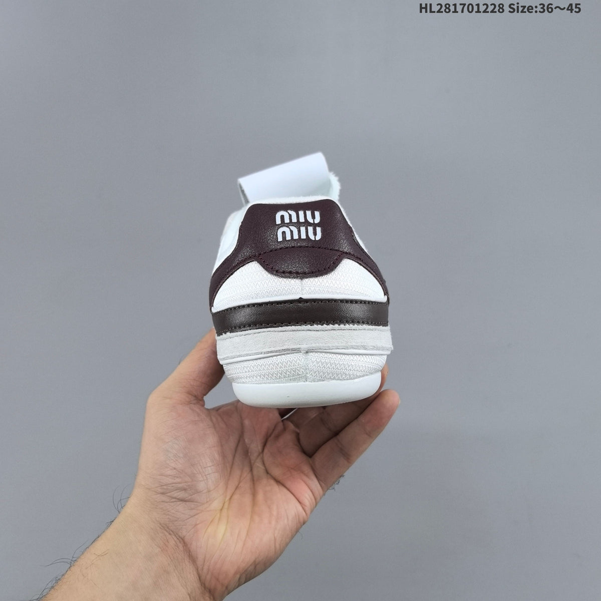 Women's Miu Miu White and Gray Lace-Up Sneakers - product image from the listing.