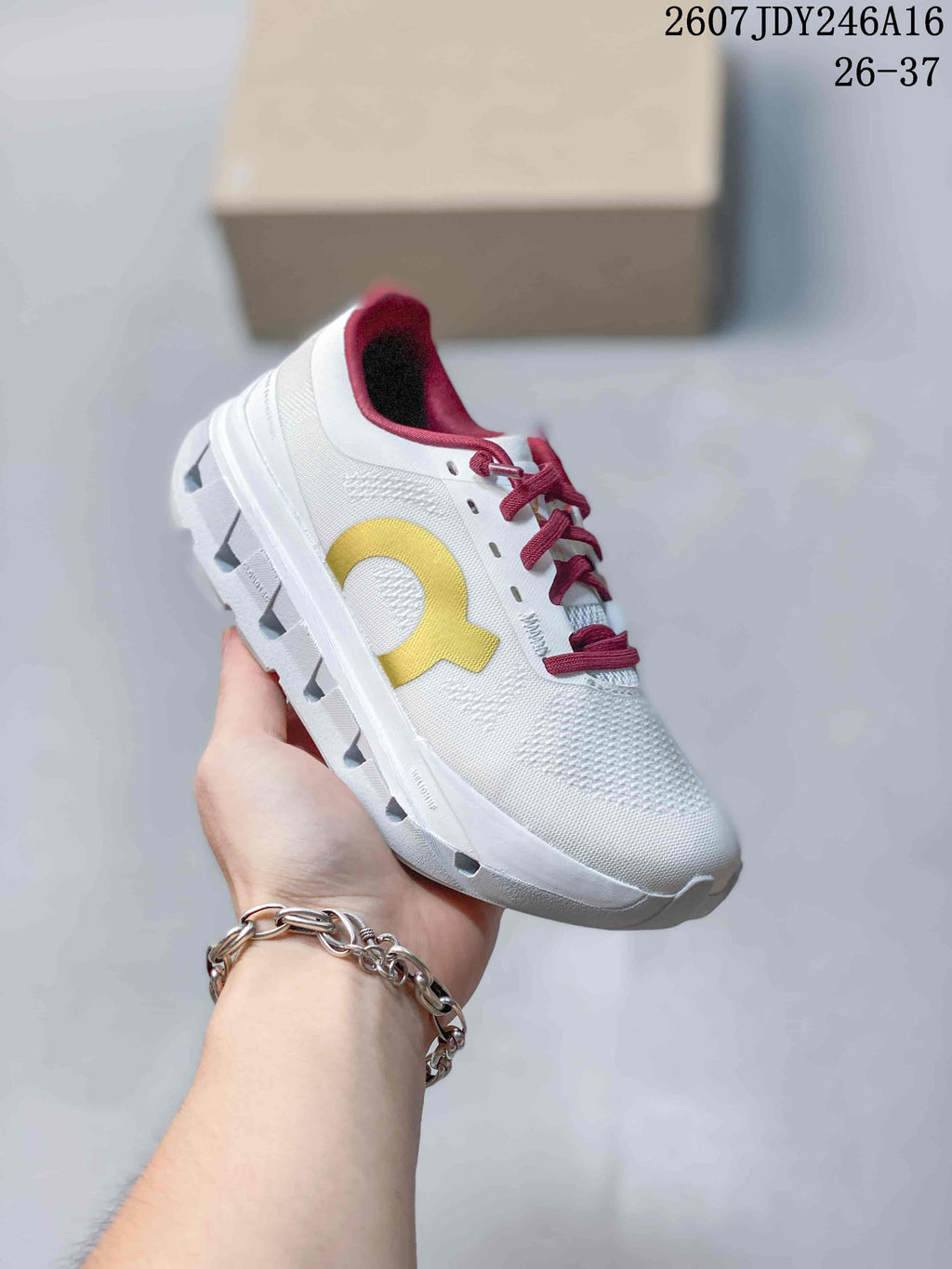 On Cloudstratus 3 Kids' Running Shoes in White Burgundy Yellow - product image from the listing.