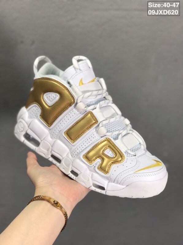 Nike Air More Uptempo Sneakers in White and Metallic Gold - product image from the listing.
