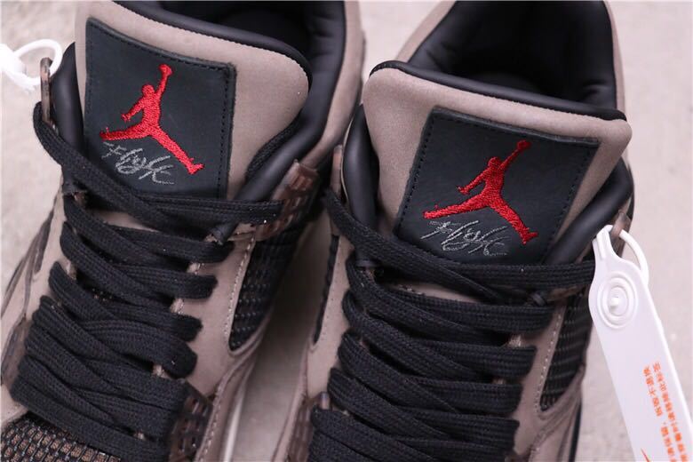 Women's Air Jordan 4 Rasta Sneakers - product image from the listing.