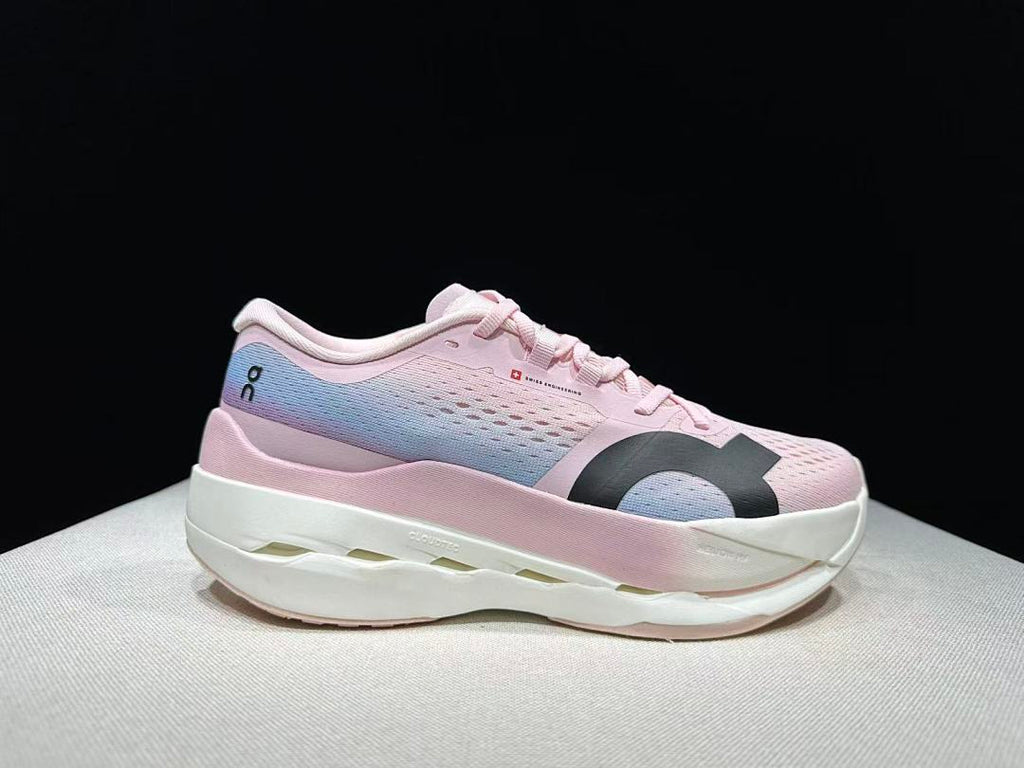 Pink and Blue On Cloudboom Max Running Shoes - product image from the listing.