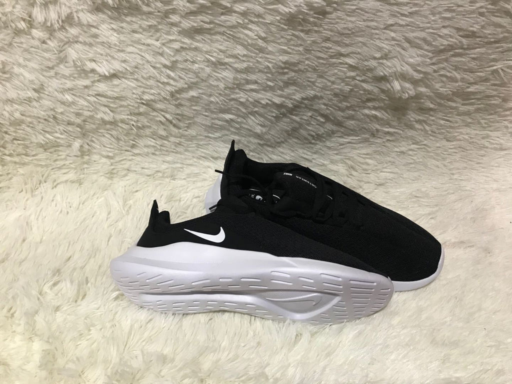 Nike Low-Top Sneakers in Black and White Knit - product image from the listing.