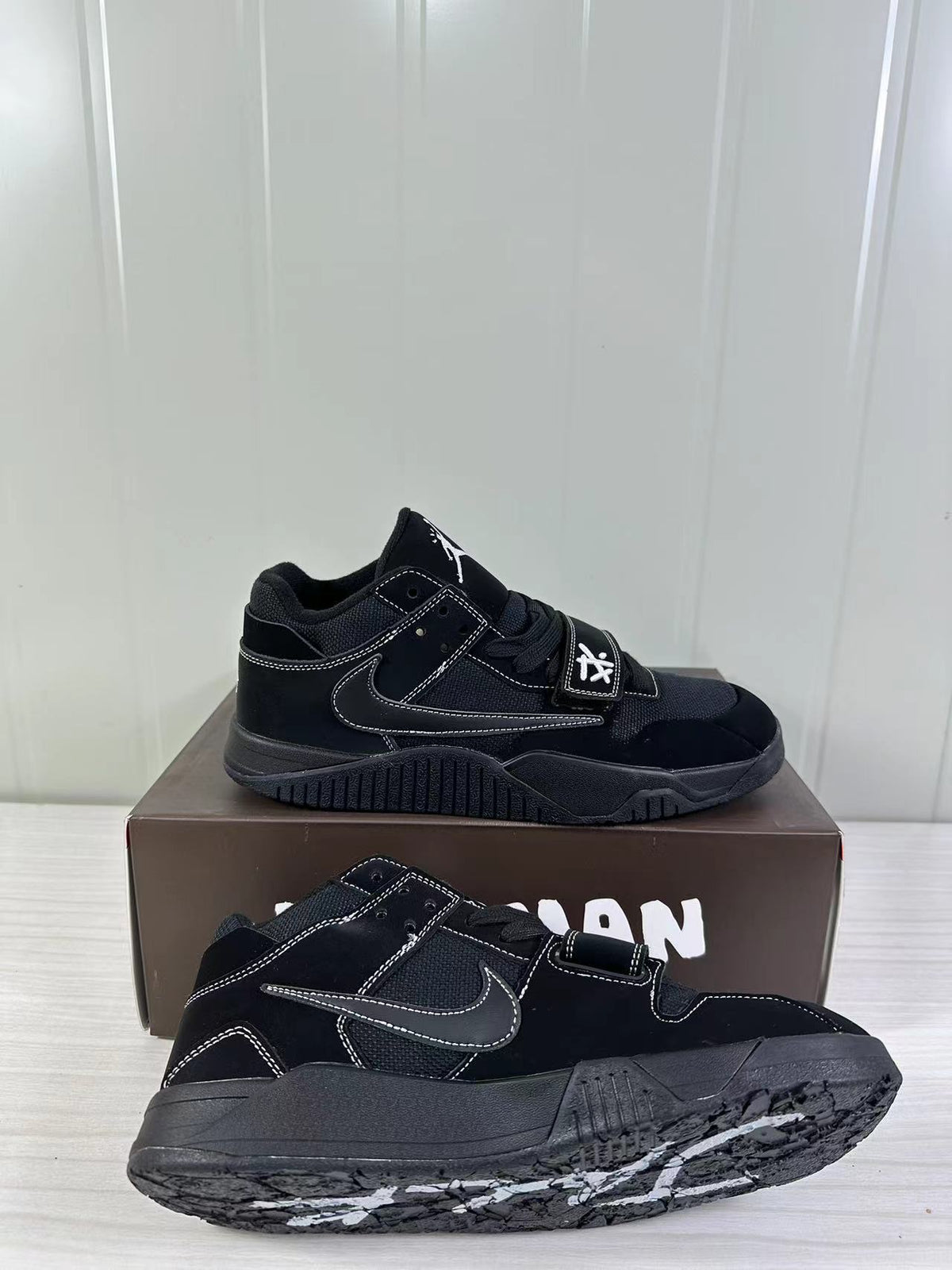 Jordan Cut the Check Sneakers in Black FZ8117-204 - product image from the listing.