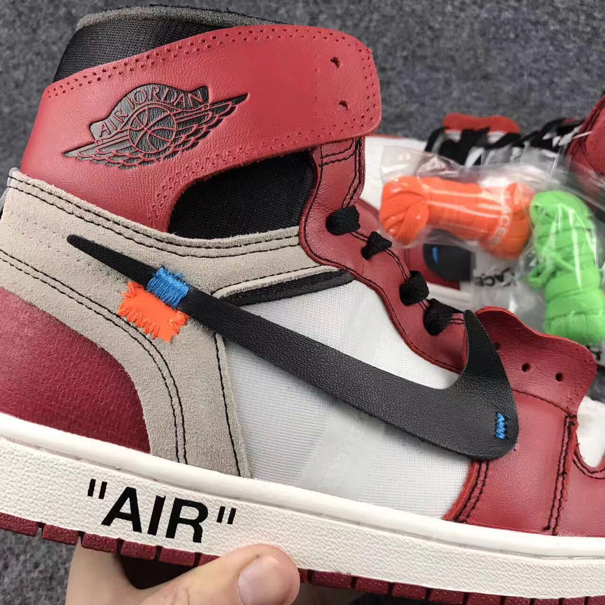 Off-White x Air Jordan 1 High Sneakers, in Red and White - product image from the listing.