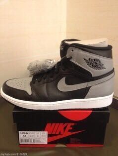 Jordan 1 High Sneakers in Grey Black - product image from the listing.
