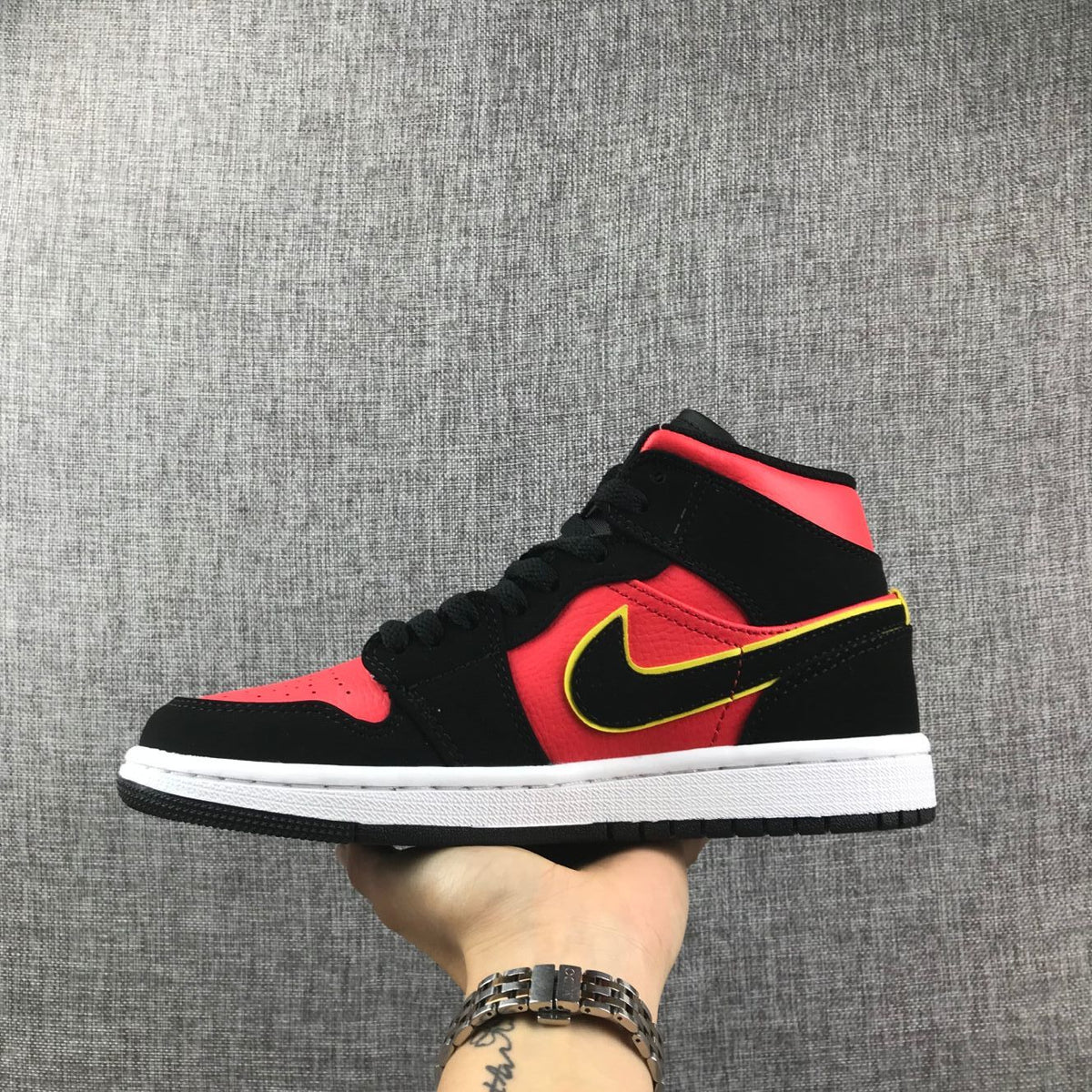 Air Jordan 1 Mid Black, Sneakers in Red and Volt - product image from the listing.