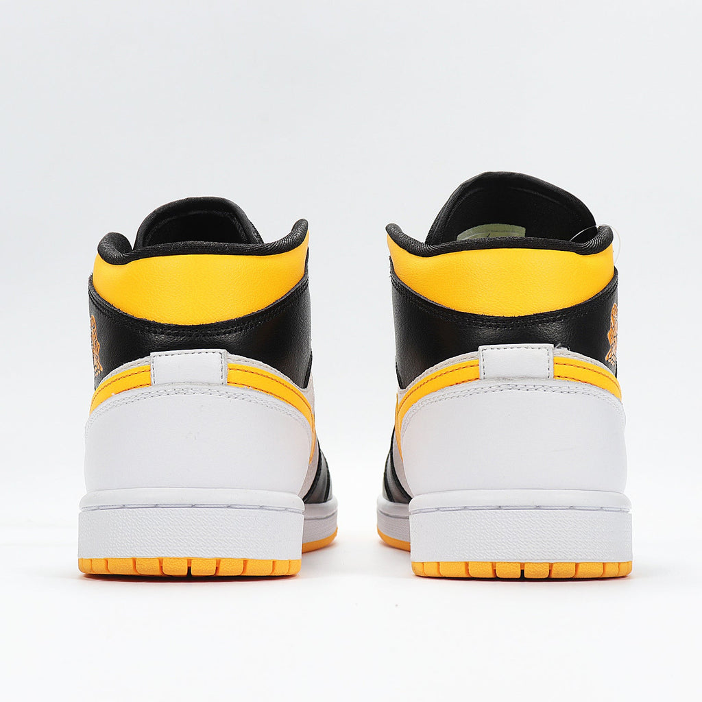 Jordan 1 High Sneakers in Black Yellow White CV5276-107 - product image from the listing.
