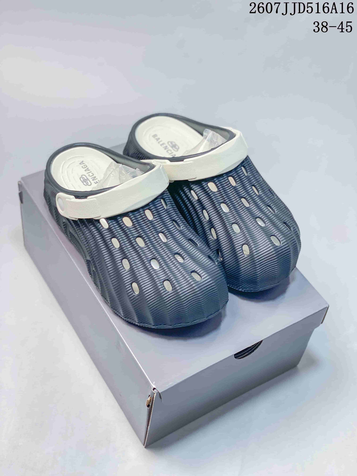 Balenciaga Logo Clogs in White and Navy 2607JJD516A16 - product image from the listing.