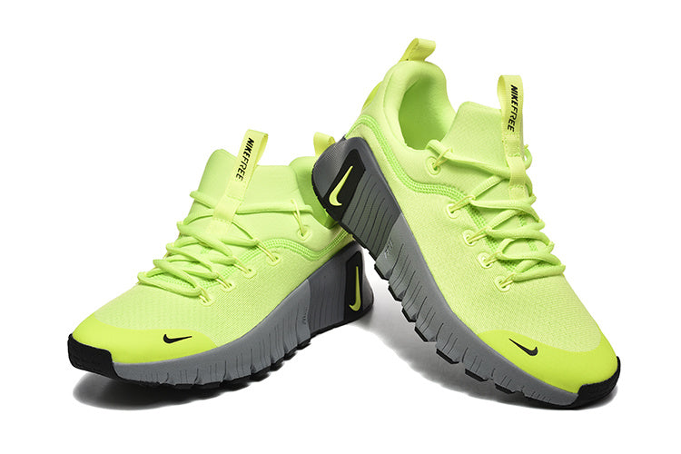 Lime Green and Charcoal Grey Nike Free Sneakers - product image from the listing.