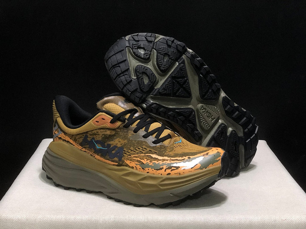 HOKA Stinson 7 Trail Shoes for Running in Camo - product image from the listing.