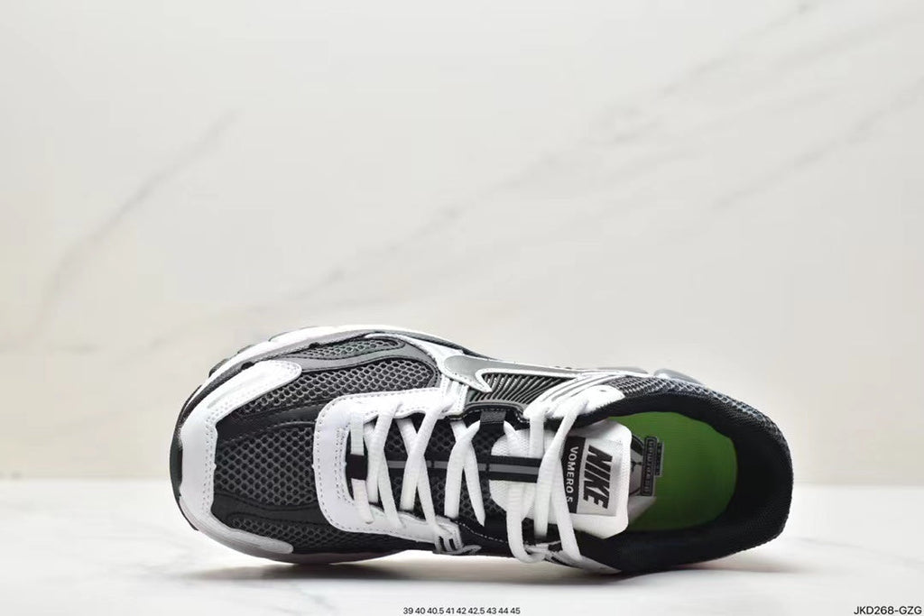 Nike Air More Uptempo Sneakers in Black and White - product image from the listing.