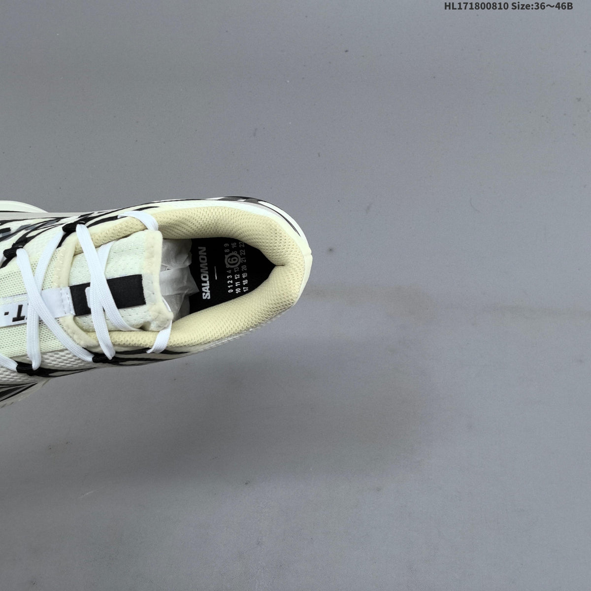 MM6 Maison Margiela x Salomon XT-4 Sneakers, in White and Black - product image from the listing.