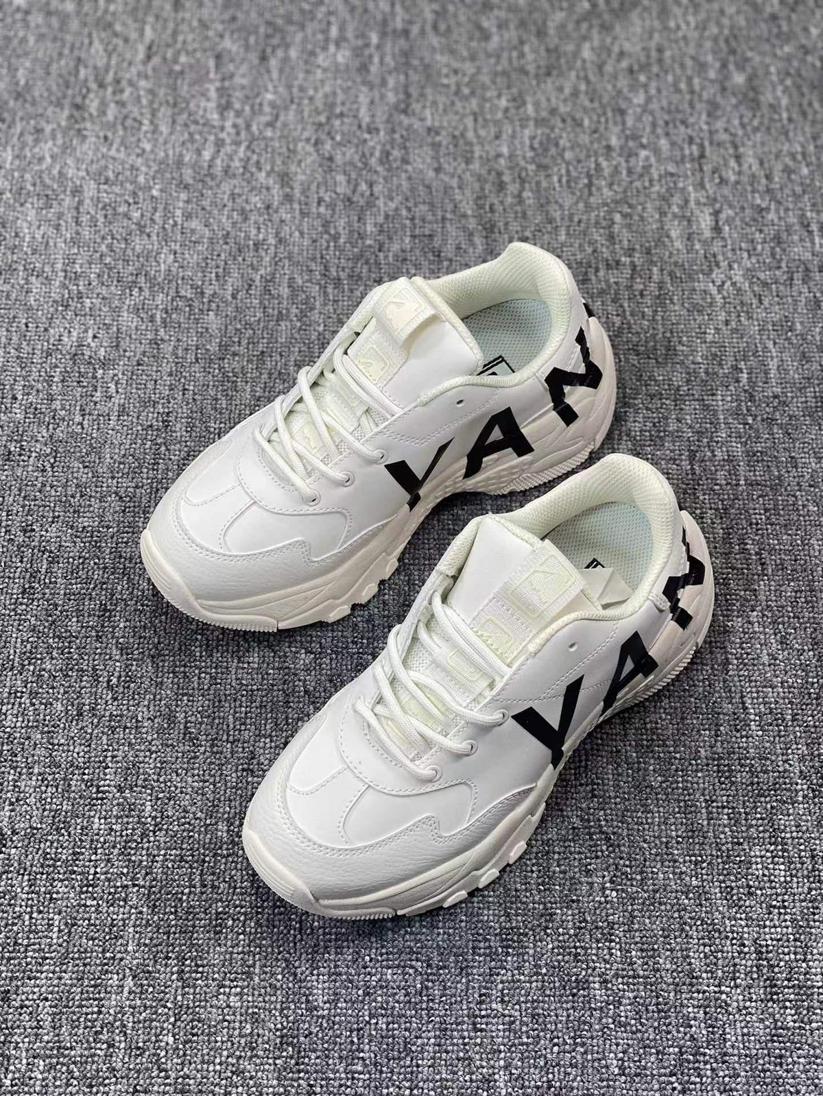 White Chunky Trainers with Black Side Graphics - product image from the listing.