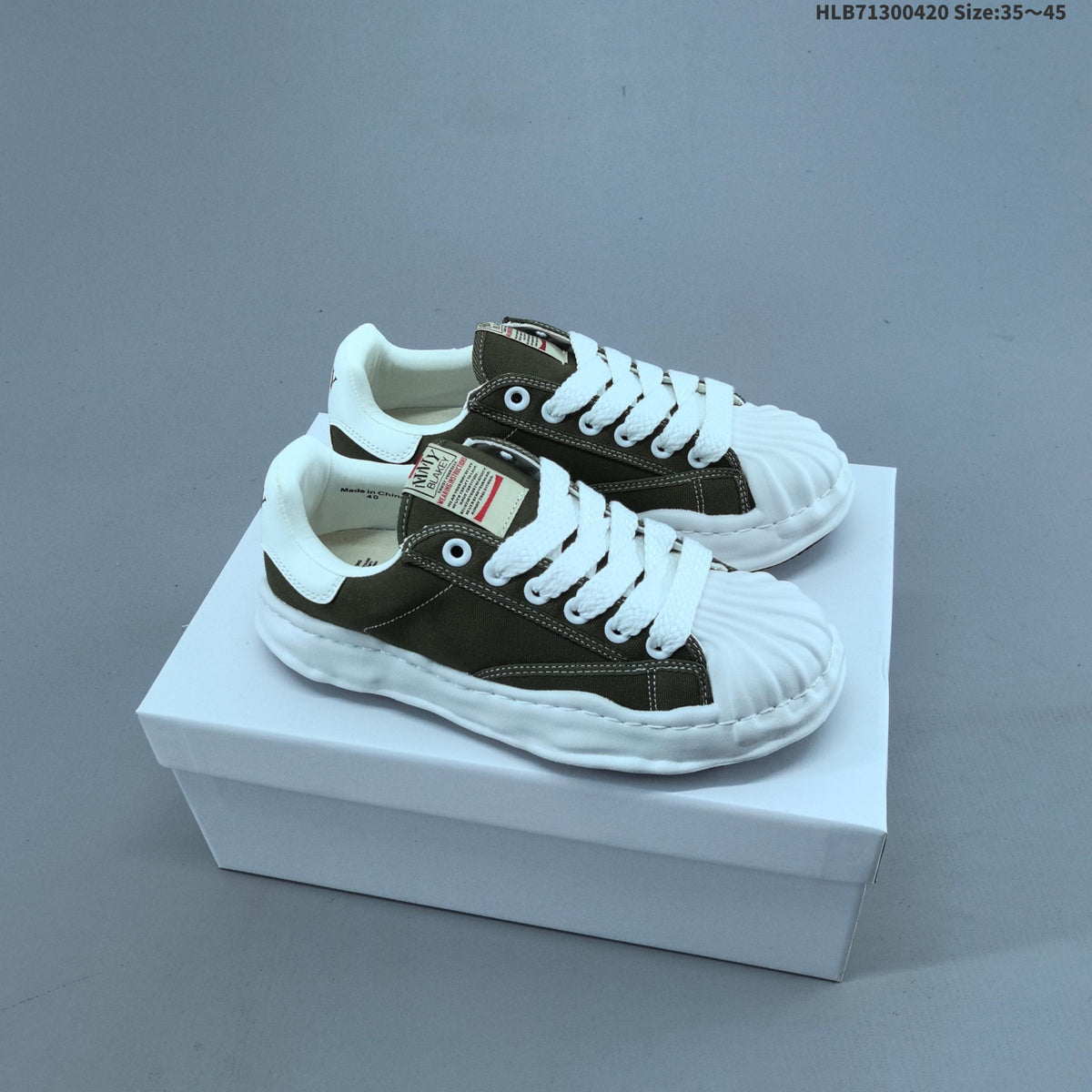 Maison Mihara Yasuhiro Original Sole Low-Cut Sneakers - product image from the listing.