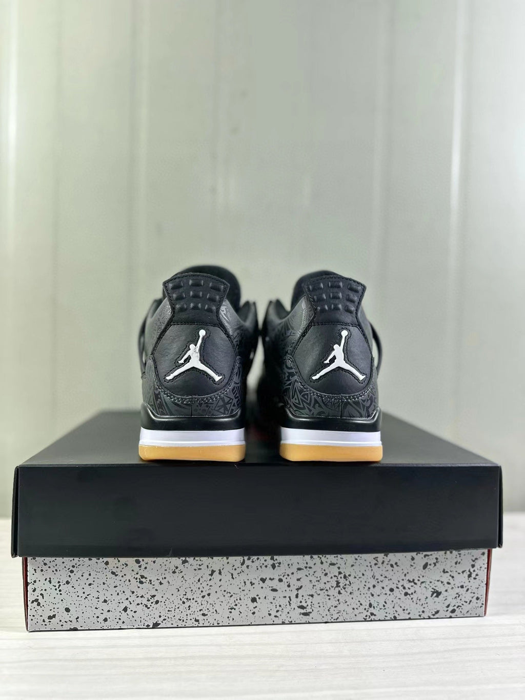 Air Jordan 4 Black Laser Sneakers CI2970-001 - product image from the listing.