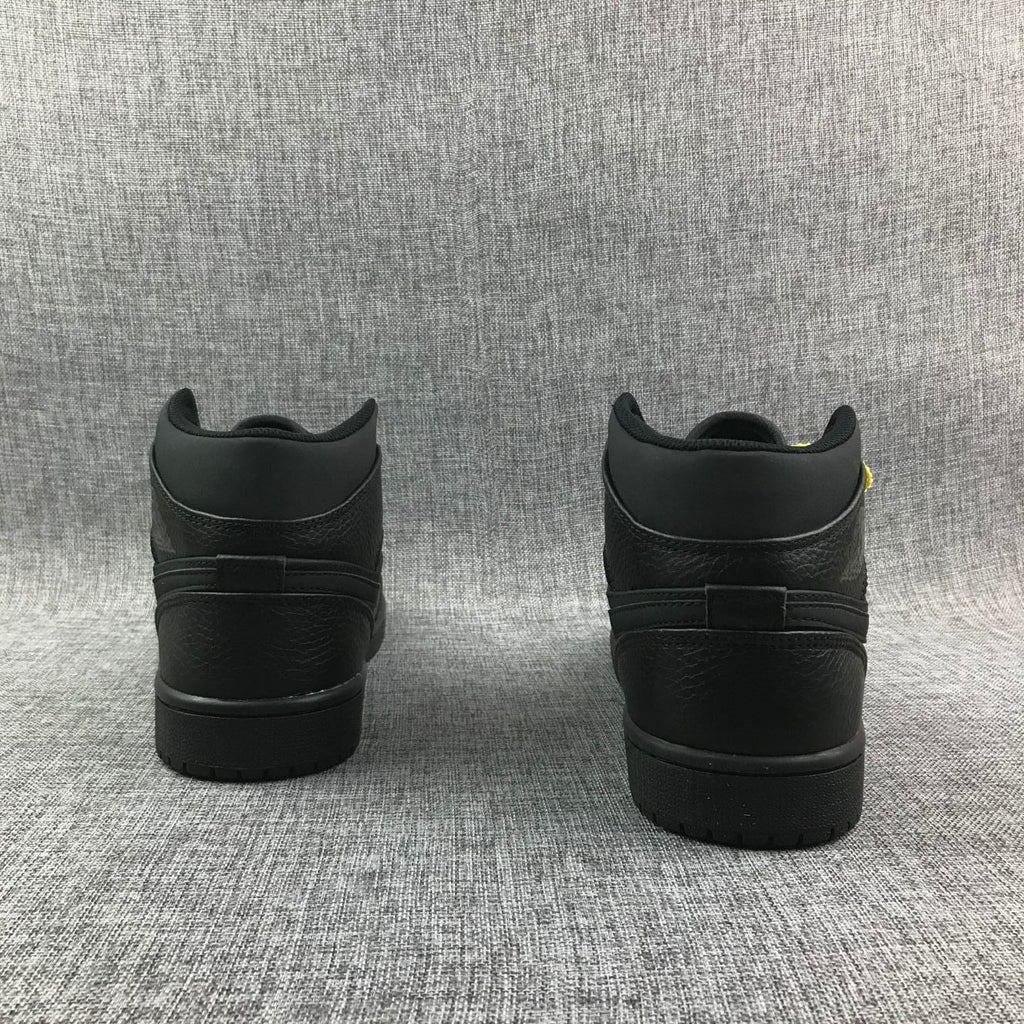 Air Jordan 1 Mid Sneakers, in Black - product image from the listing.