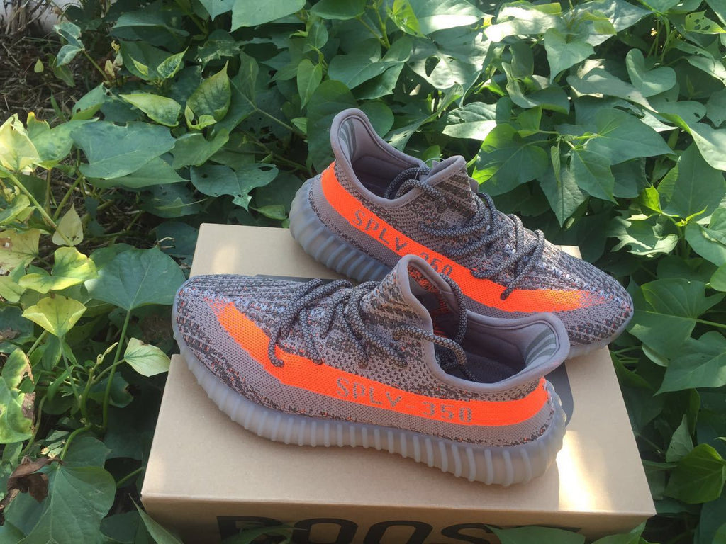 Yeezy 350 V2 Sneakers in Gray and Orange Knit - product image from the listing.