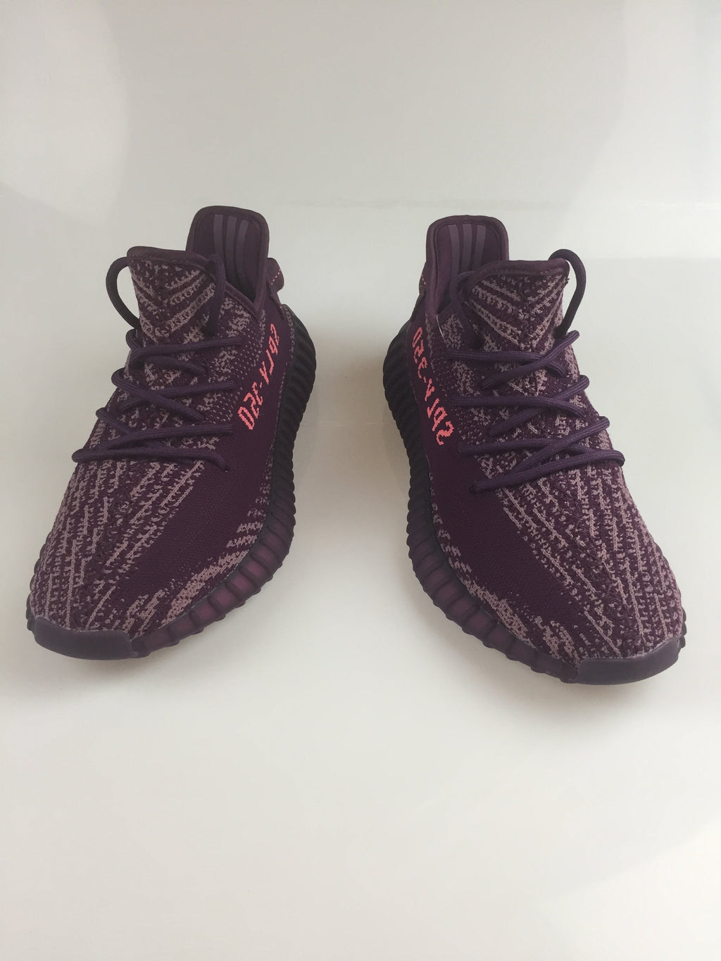 Black and Beige Yeezy 350 V2 Knit Sneakers - product image from the listing.