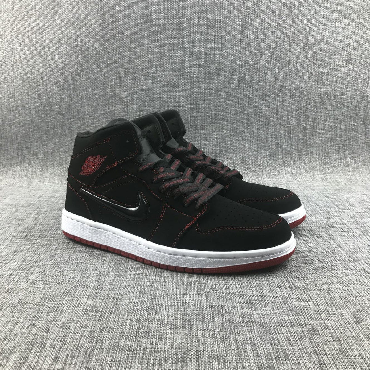 Air Jordan 1 Mid Sneakers Black Red CK5665-062 - product image from the listing.