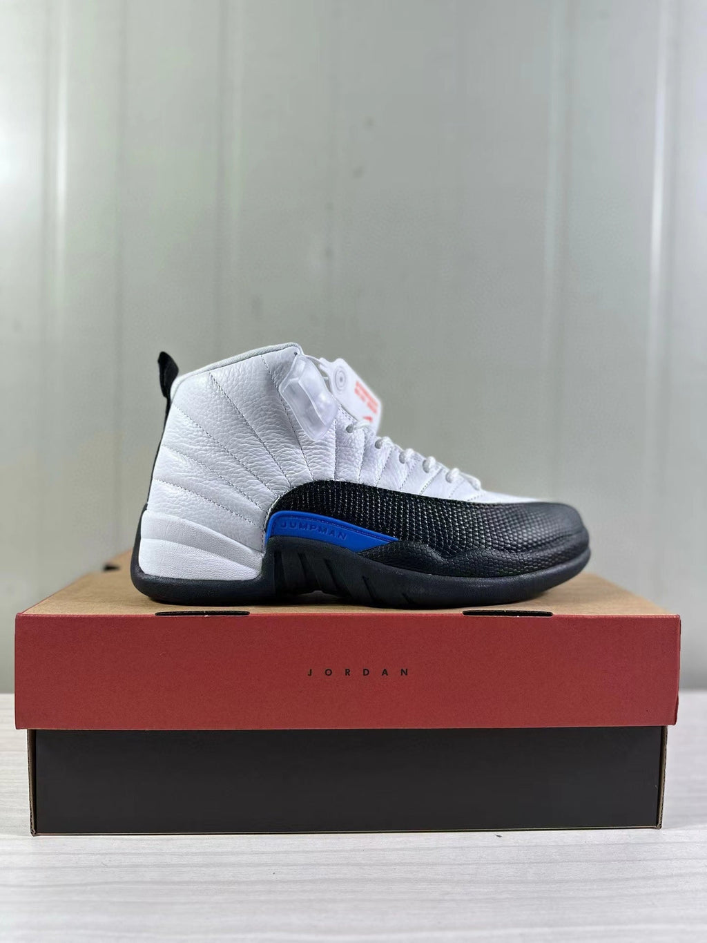 Air Jordan 12 Retro White Black Game in Royal CT8013-140 - product image from the listing.