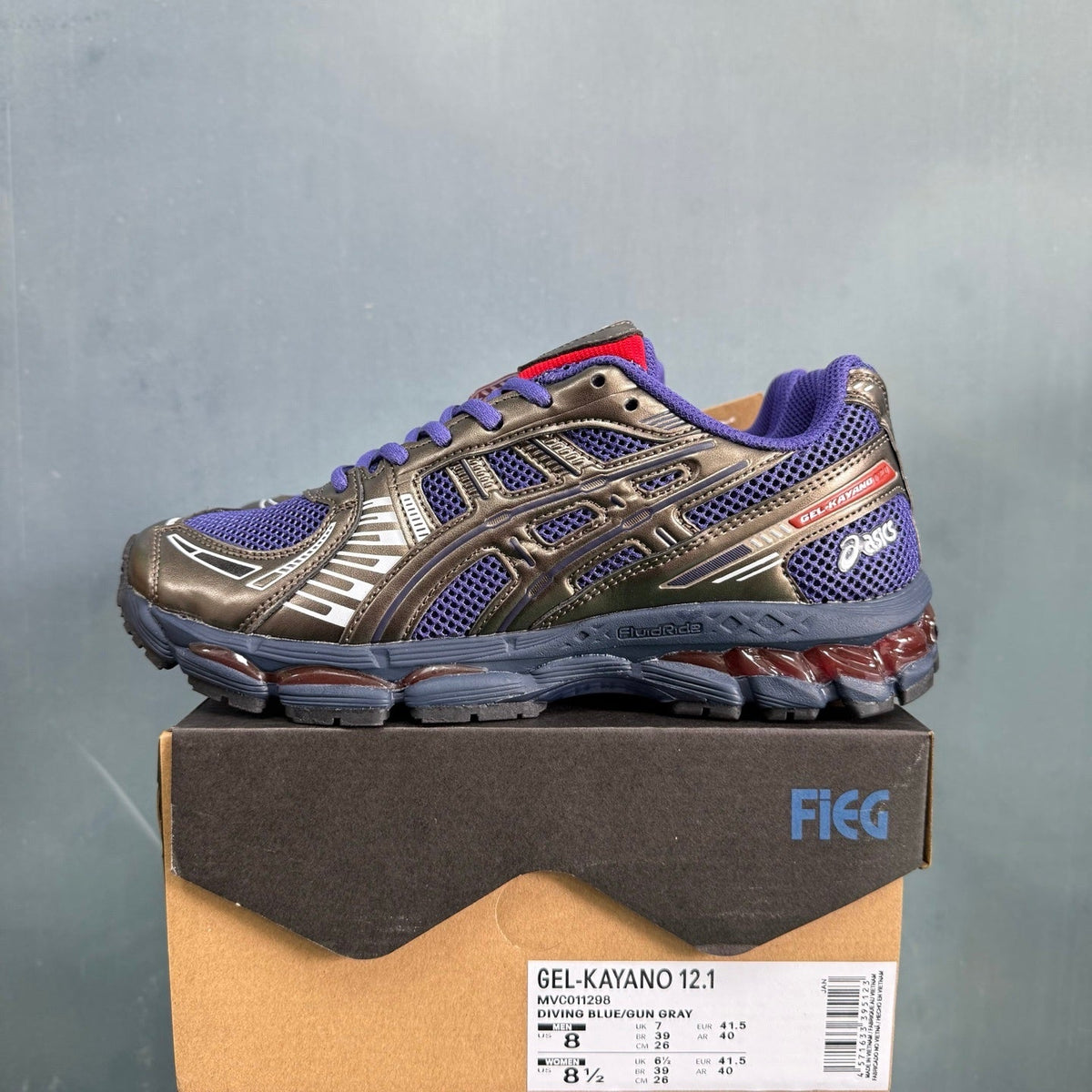 ASICS GEL-KAYANO 12.1 Blue and Gunmetal Trainers - product image from the listing.