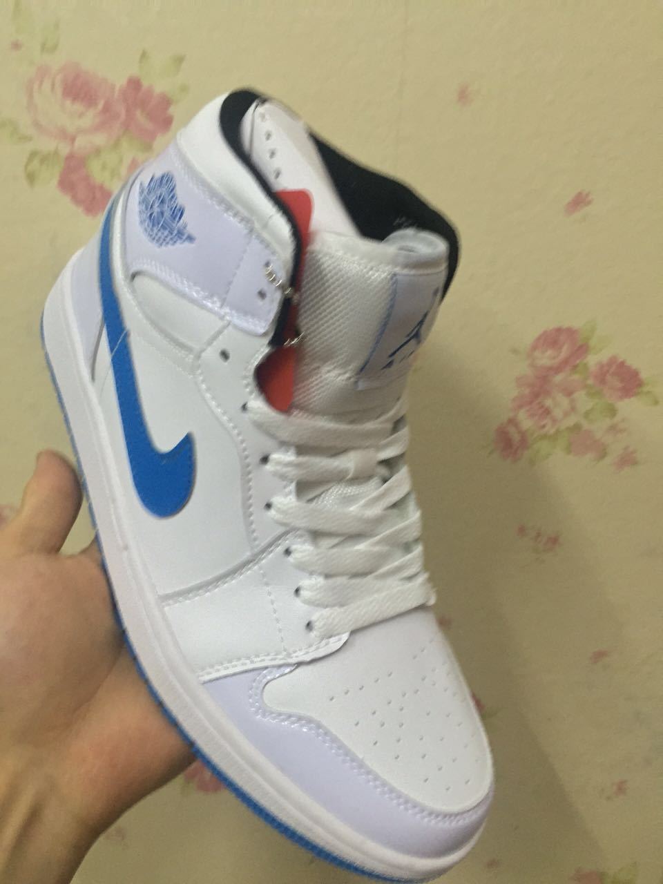 Air Jordan 1 High White and Royal Blue Sneakers - product image from the listing.