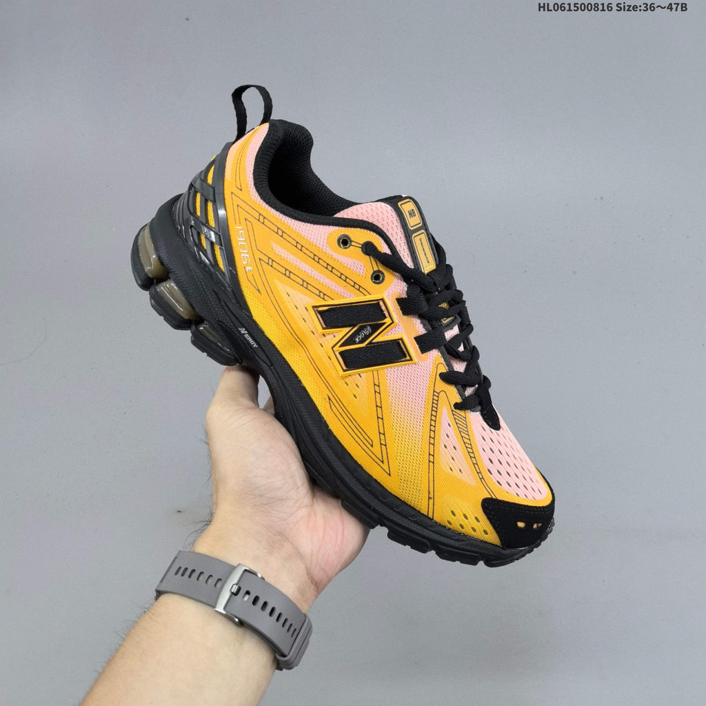 New Balance M1906R Sneakers in Pink Yellow Black U1906596 - product image from the listing.