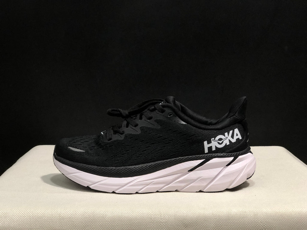 HOKA Clifton 8 Running Shoes, in Black and White - product image from the listing.