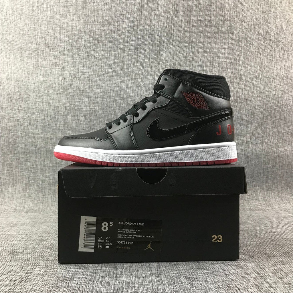 Air Jordan 1 Mid High-Top Sneakers in Black Red White - product image from the listing.