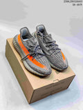 adidas Yeezy Boost 350 Sneakers in Gray Orange - product image from the listing.