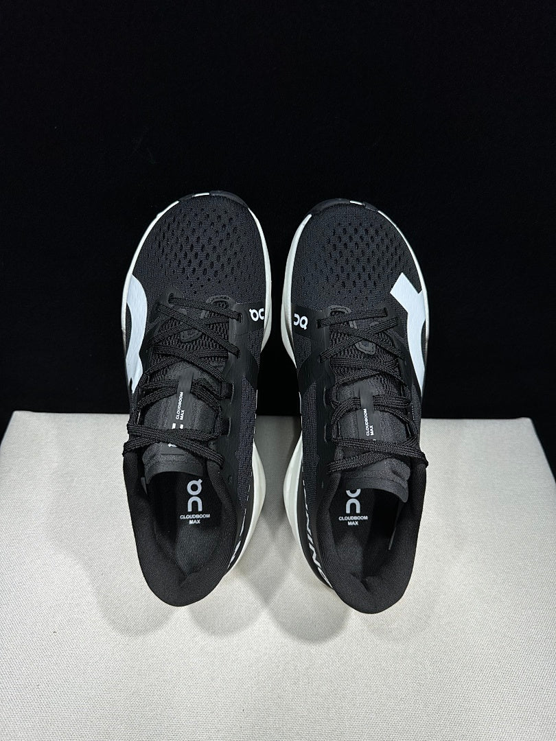 On Cloudboom Max Shoes for Running, Black/White - product image from the listing.