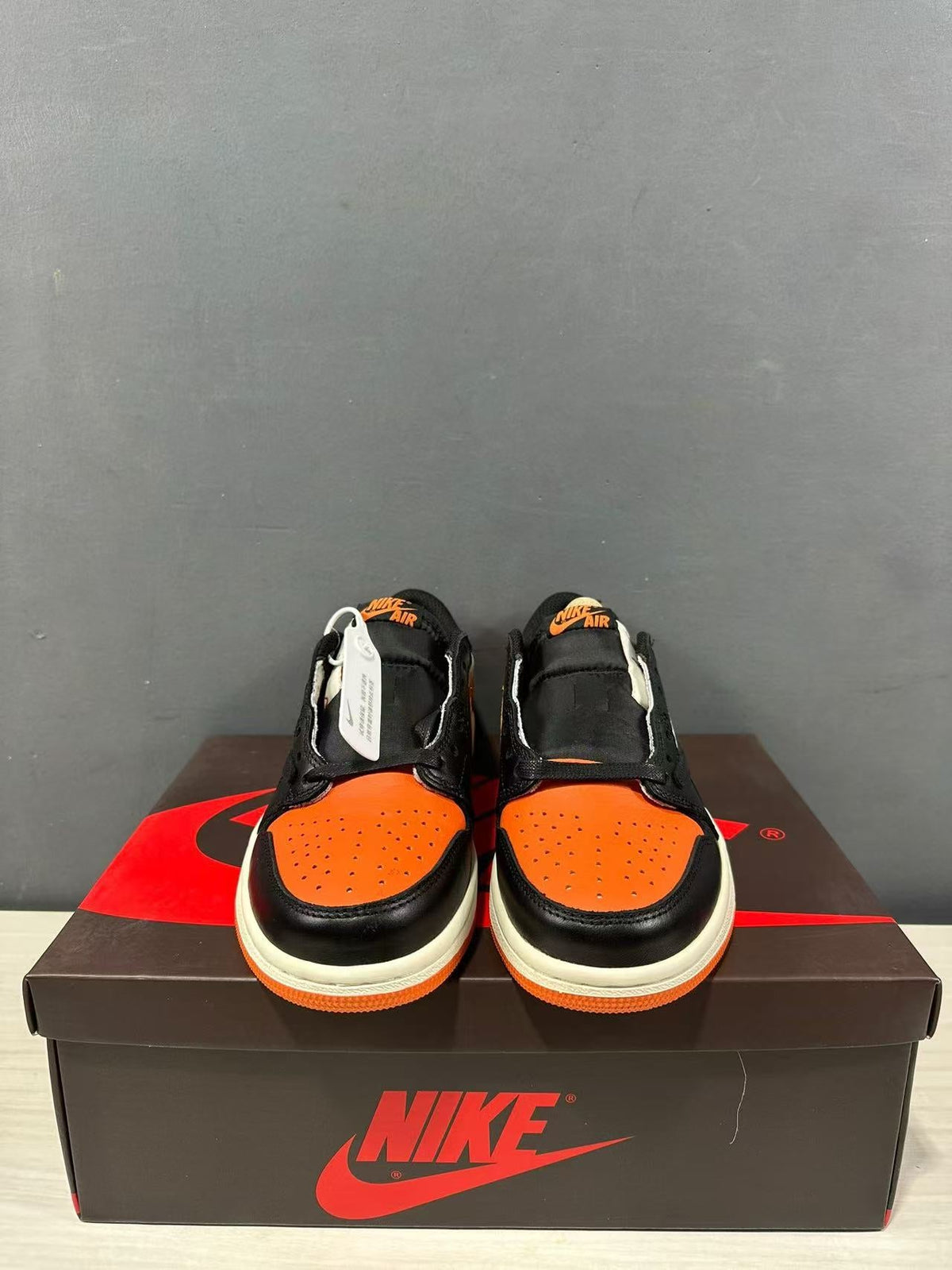 Air Jordan 1 Low Golf Shattered Backboard Black Orange - product image from the listing.