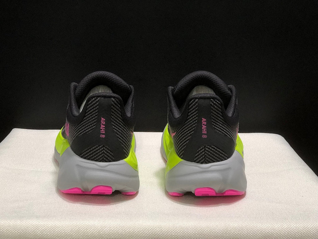 HOKA Arahi 8 Running Shoes, Black and Neon in Yellow - product image from the listing.