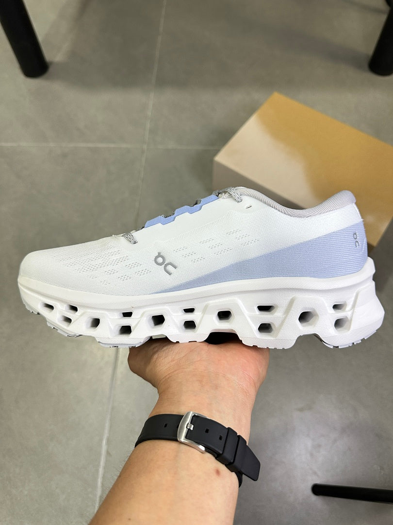 On Running Cloudsurfer Next Running Shoes in White Blue - product image from the listing.