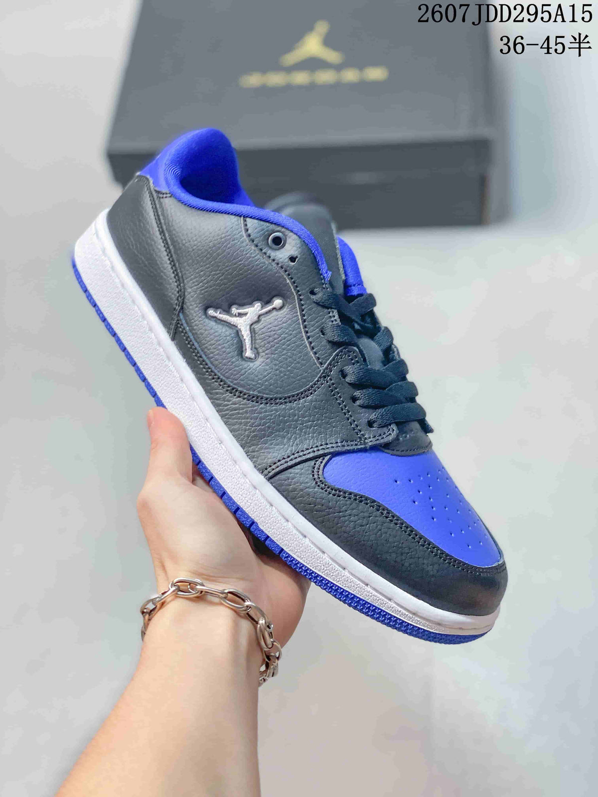 Air Jordan 1 Low Black Blue White Sneakers - product image from the listing.