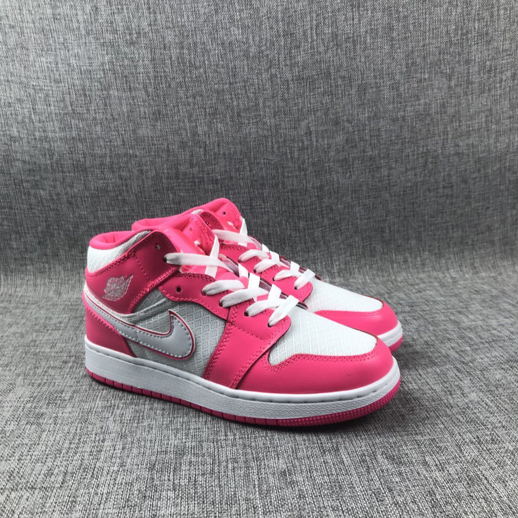Air Jordan 1 Mid Sneakers in White Pink 555112-611 - product image from the listing.