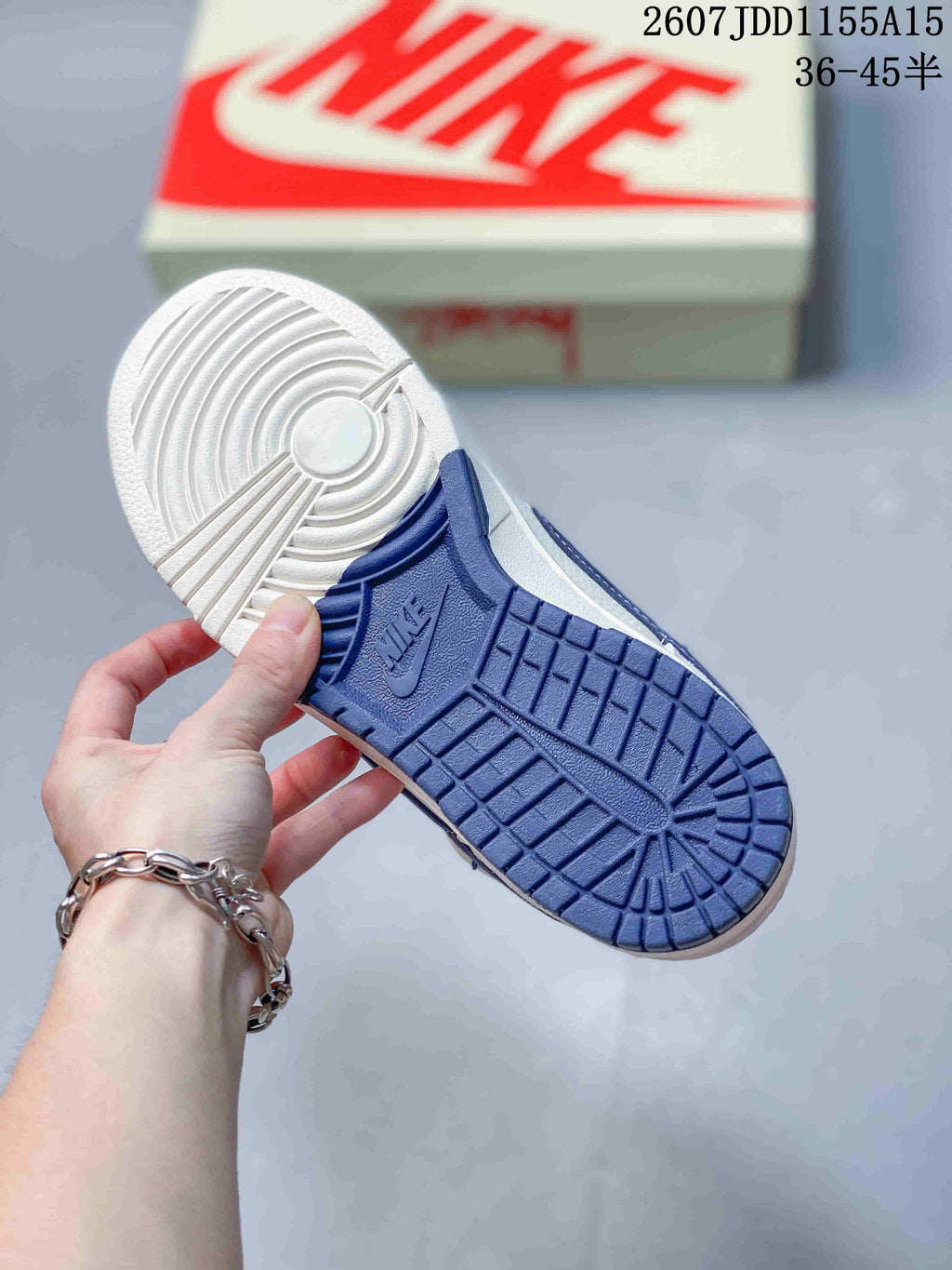 Nike SB Dunk Low Stussy Sneakers in White Grey Navy - product image from the listing.