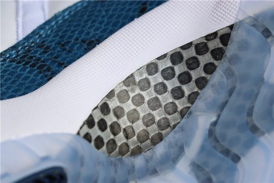 Navy Snakeskin Sneakers - Air Jordan 11 Low - product image from the listing.