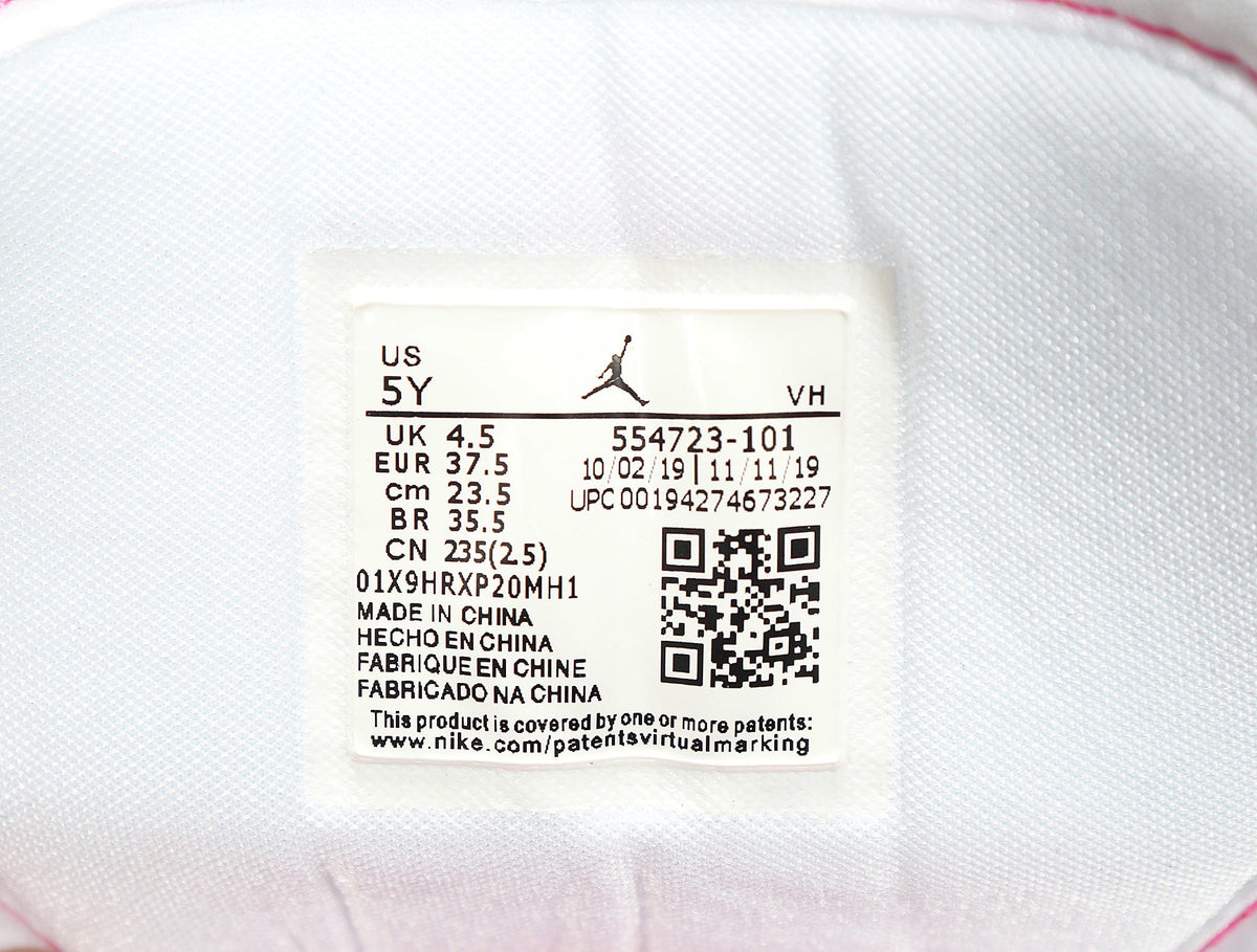 Nike Air Jordan 1 Low Sneakers in White Pink 554723-101 - product image from the listing.
