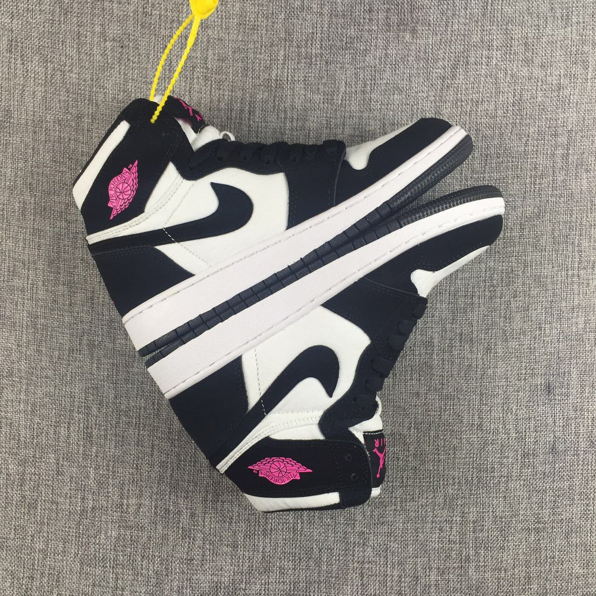 Air Jordan 1 High Black White Pink Sneakers - product image from the listing.