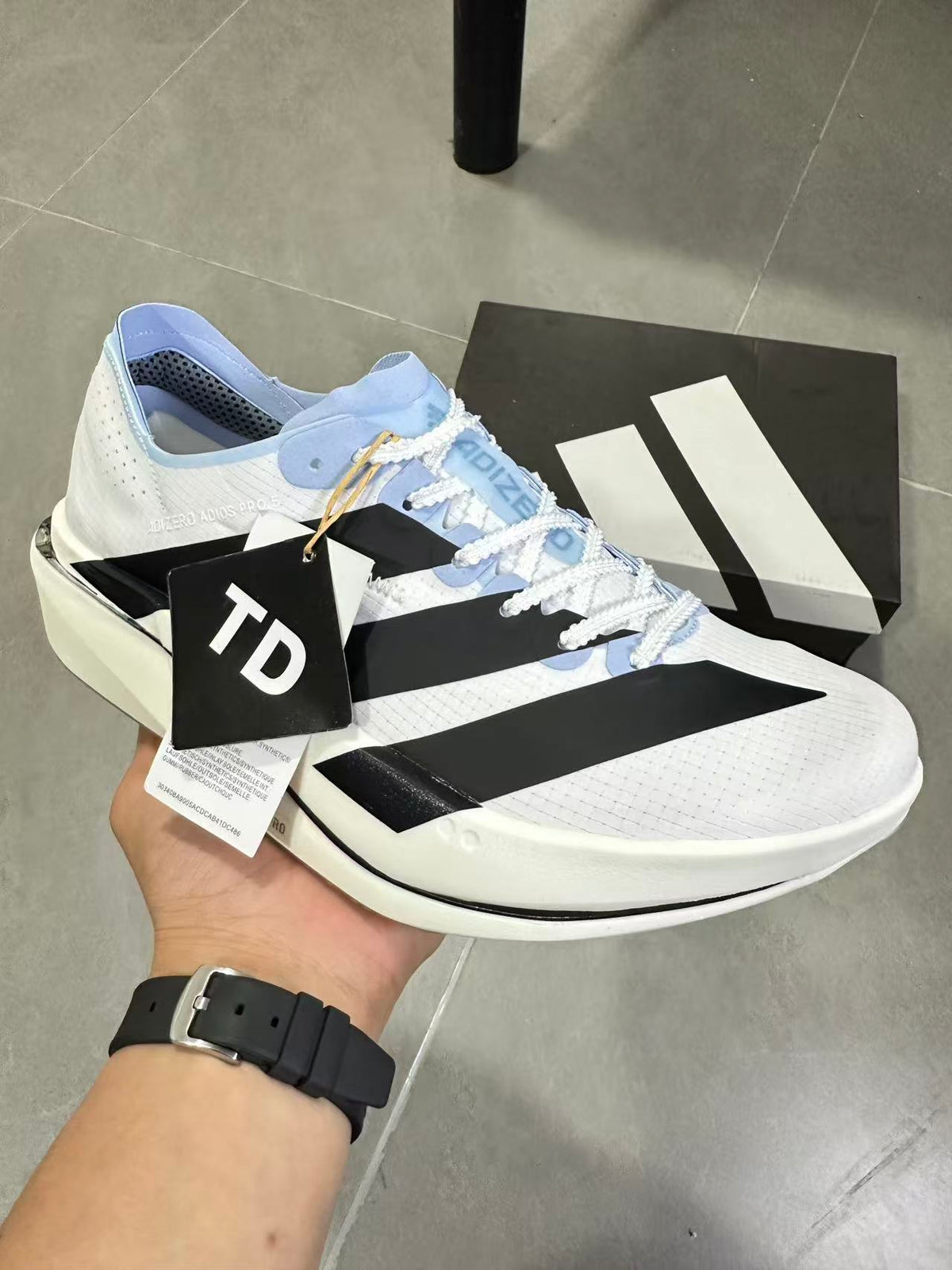 adidas Lightstrike Pro Running Shoes in White Blue KI8298 - product image from the listing.