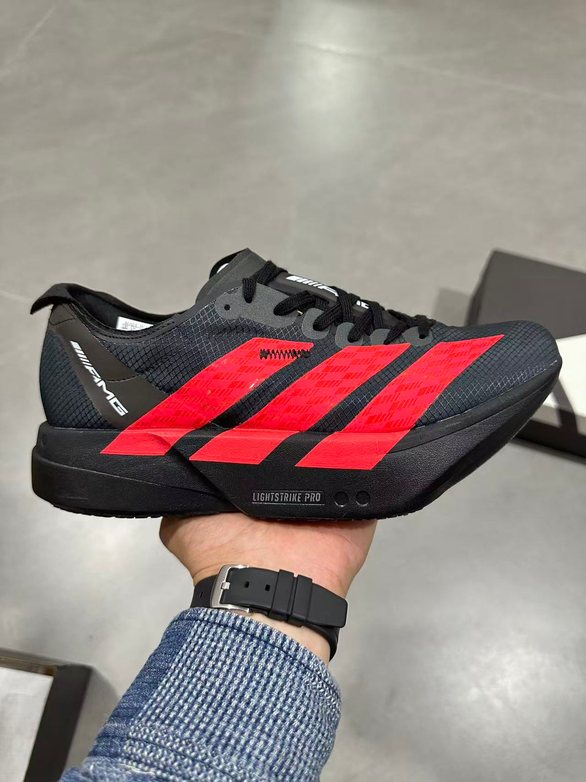 Adidas Lightstrike Pro Running Shoes in Black Red KH8840 - product image from the listing.