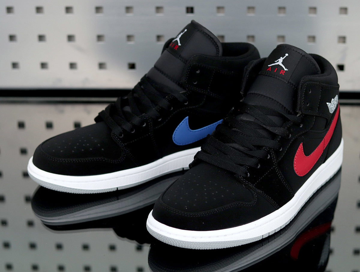 Jordan 1 Retro High Sneakers in Black Red Blue 554725-065 - product image from the listing.