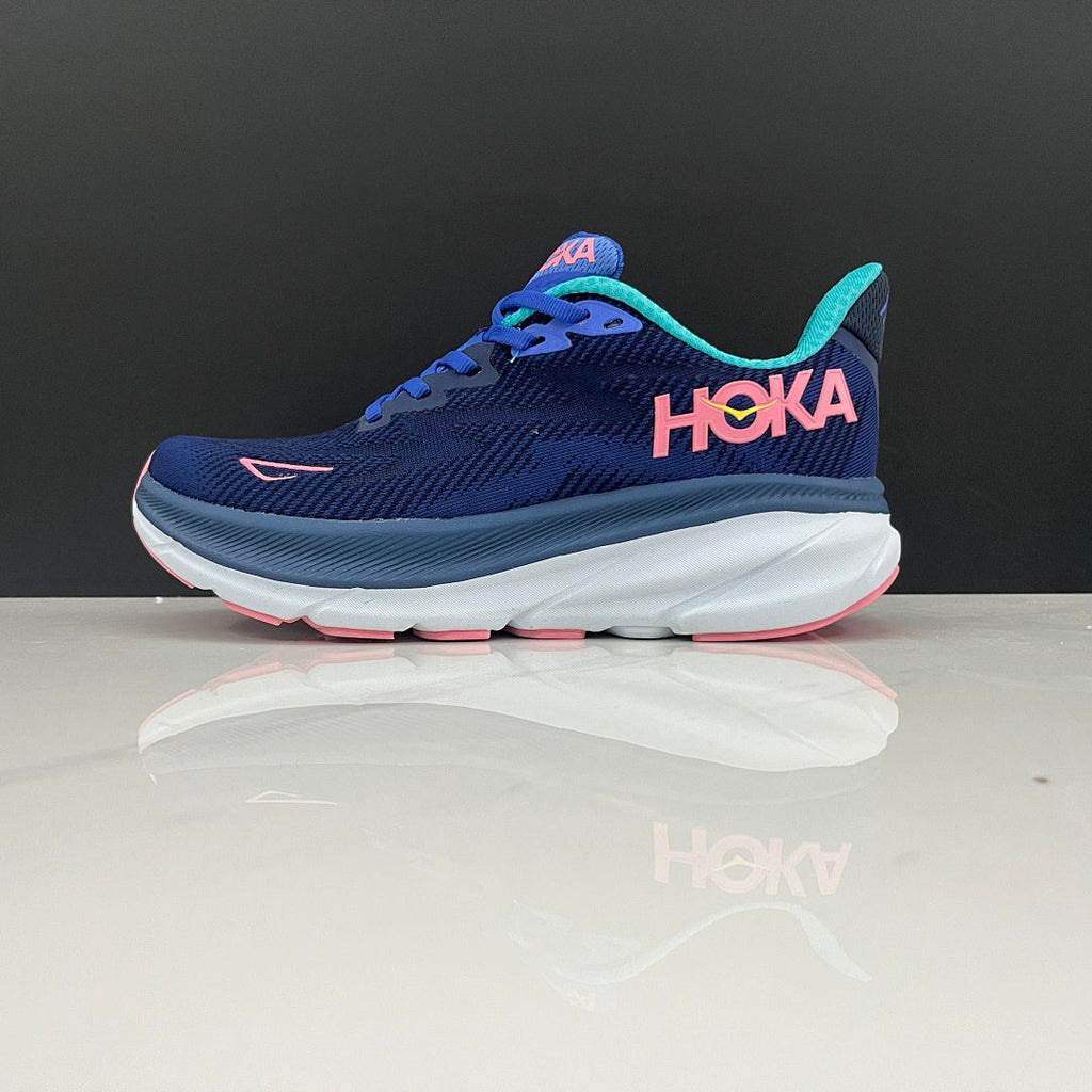 Navy and Light Blue HOKA Clifton 9 Running Shoes - product image from the listing.
