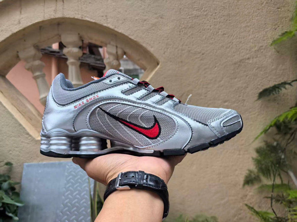 Silver Grey and Red Nike Shox Sneakers - product image from the listing.