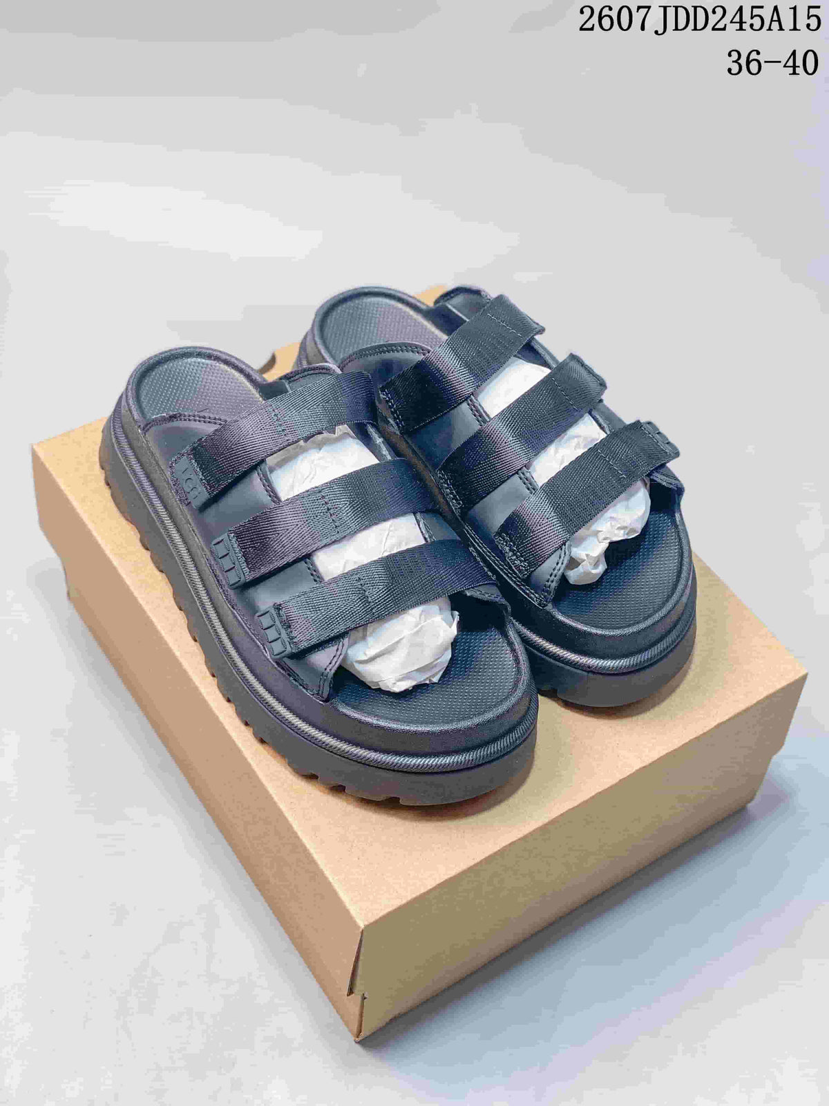 GoldenGlow Black Platform Slide Sandals 07JDD245A15_002 by UGG - product image from the listing.
