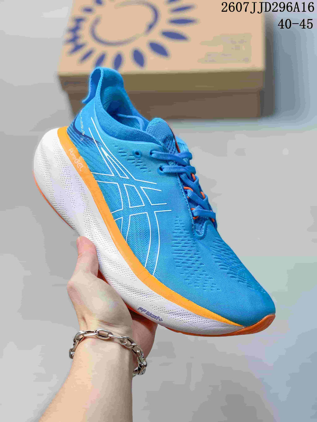 ASICS GEL-Nimbus 25 Running Shoes in Blue Orange - product image from the listing.