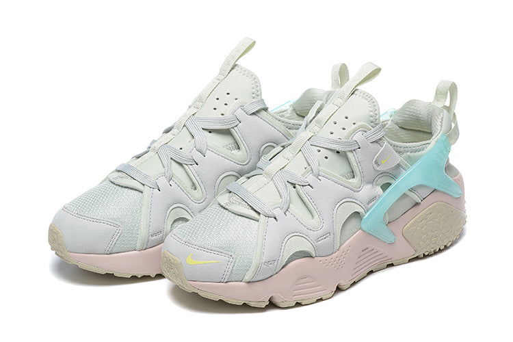 Nike Air Huarache Sneakers in Light Grey Pink Aqua - product image from the listing.