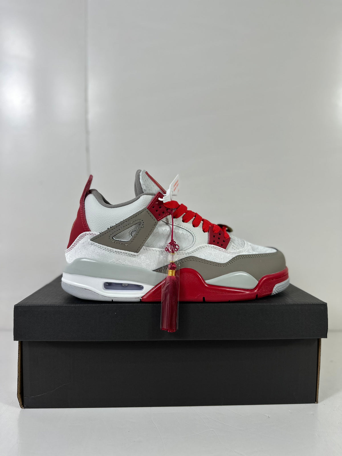 Jordan Dub Zero Basketball Sneakers in Red White Gray 311046-160 - product image from the listing.