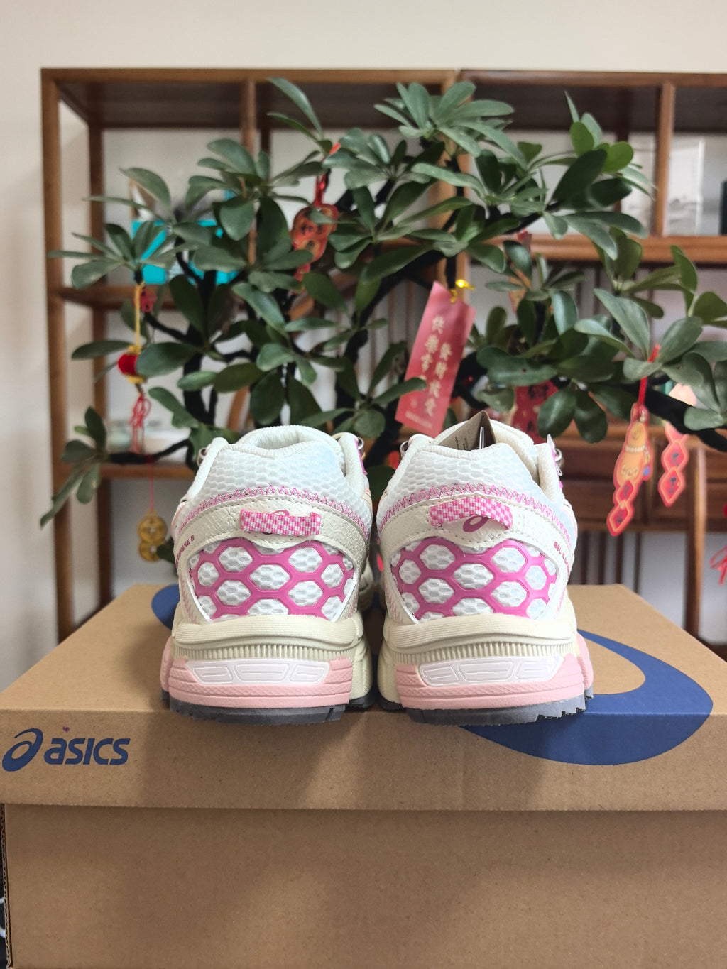 Pink and White ASICS KL1 Sneakers - product image from the listing.